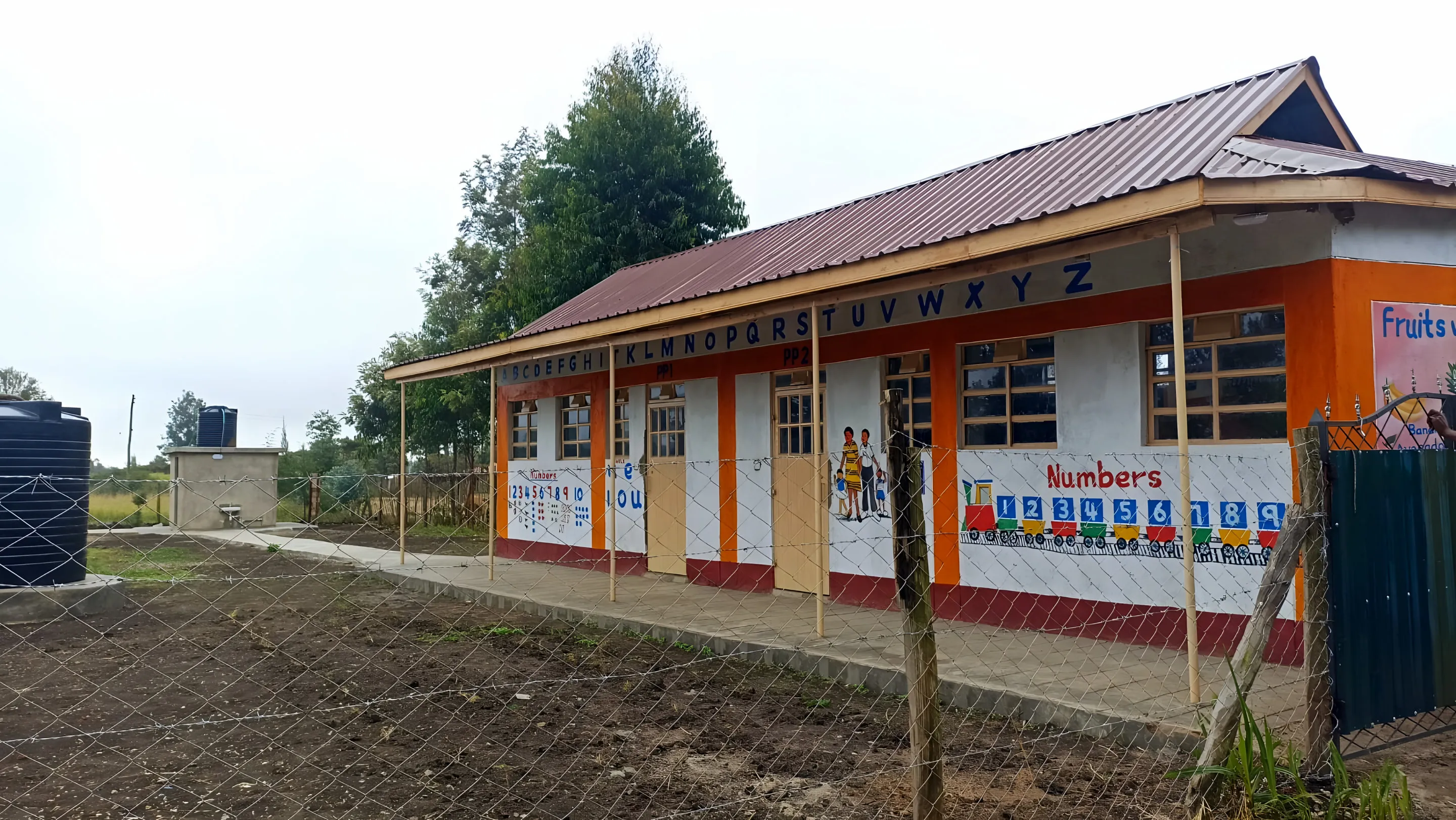 PP1 and PP2 classrooms painted with alphabet and number murals